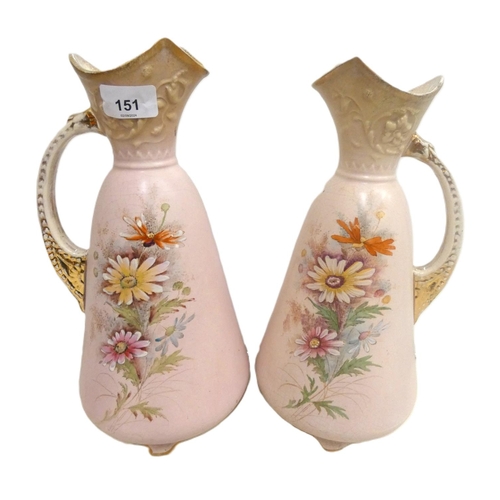 151 - Large pair of pink floral Continental jugs, 32cm high.