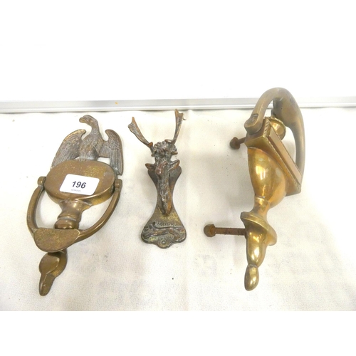 196 - Three vintage brass door knockers, one in the form of a stags head and other brass ware.