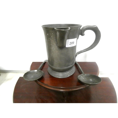 209 - Antique pewter tankard and two early pewter spoons.