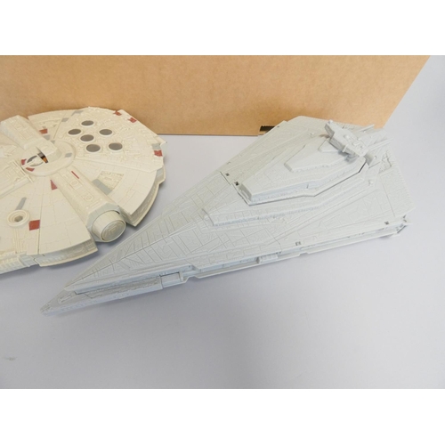 312 - Collection of Star Wars to include a Millenium Falcon, Imperial Star Destroyer, and a quantity of co... 