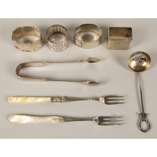 164 - Assorted silver & silver plated items including napkin rings, draining ladle, pickle forks &... 