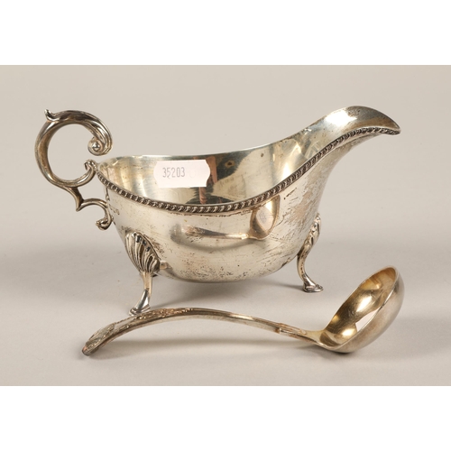 166 - Silver footed sauce boat, assay marked Sheffield 1940 by William Hutton & Sons Ltd. Total weight... 