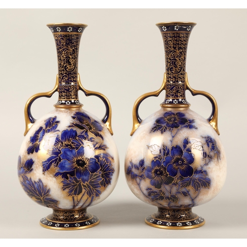 24 - Doulton Burslem pair of blue gilt twin handled vases(Damaged)