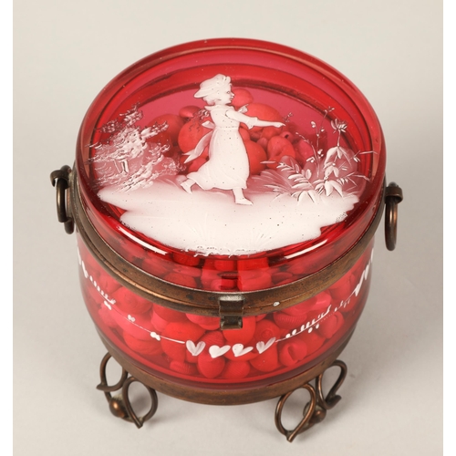 25 - Mary Gregory cranberry glass jar, contains large quantity of small shells, 9cm h x 9cm d