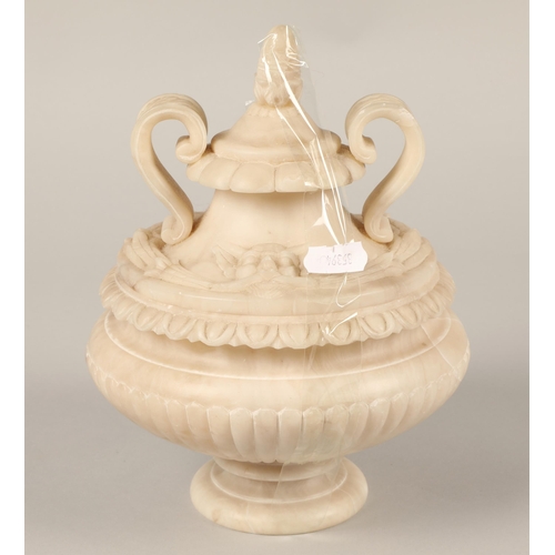 32 - Alabaster twin handled lidded urn, 22cm h