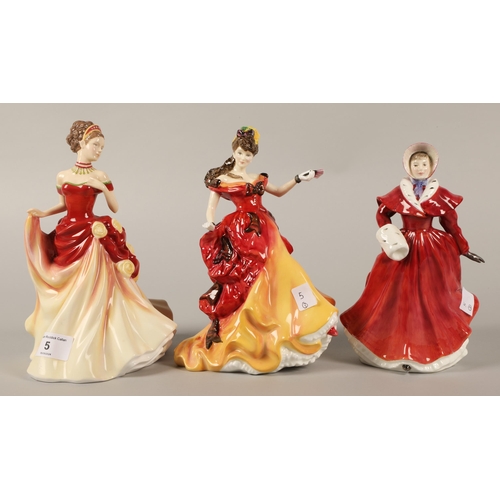 5 - Three Royal Doulton figurines to include Autumn Ball HN5465, The Skater HN3439, and Belle HN370... 