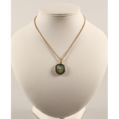 56 - Yellow metal green and grey enamelled locket set with a seed pearl, on a 15ct gold chain, chain weig... 