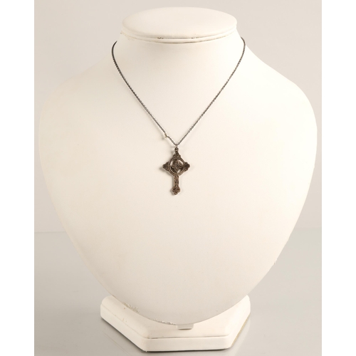 73 - Silver flower necklace inlaid with mother of pearl, a silver celtic cross necklace, and a silver ban... 