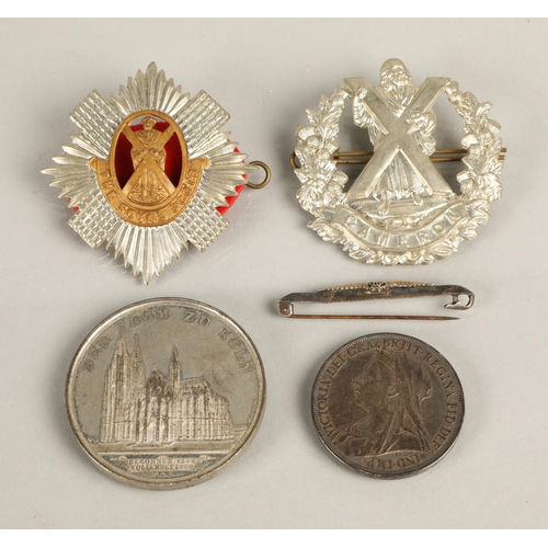 94 - Two cap badges Royal Scots and Royal Camerons, an 1895 Victoria silver crown, Der Dom Zu Koln Cologn... 