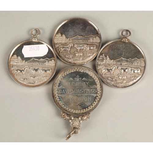 96 - Four white metal agricultural medals, Girvan District and Carrick Farmers Society, dated 1887, 1892,... 