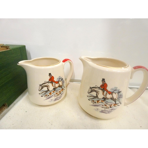 301 - Collection of hunting themed jugs and cups and collectors plates.