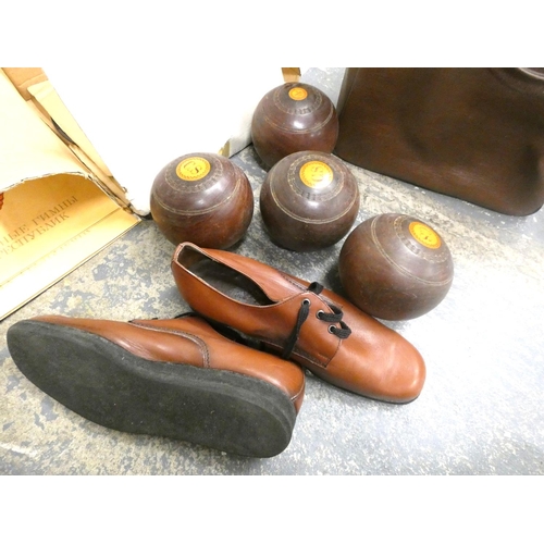 319 - Set of antique C S wood lawn bowls and a pair of bowling shoes.