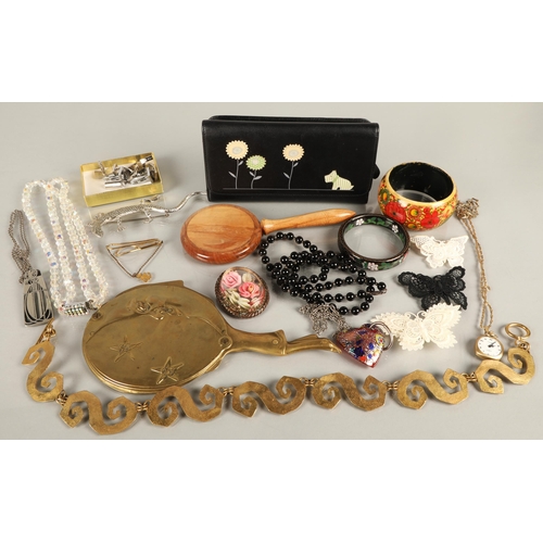 82 - Assorted vintage jewellery and accessories to include brass pierrot and moon design hand mirror, a c... 