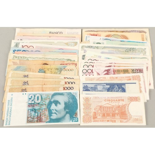 88 - Collection of world banknotes to include Belgium, Spain, Canada, Singapore, Brunei, Brazil, etc