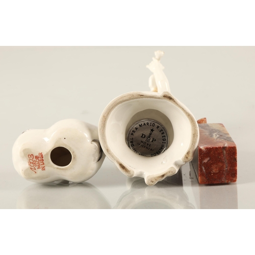 210 - Lomonosov USSR Russian porcelain rabbit, an Oriental soapstone seal, and a continental porcelain put... 