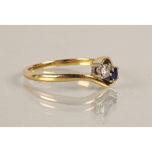 121 - 18ct gold ring, toi et moi set with a diamond and sapphire, ring size U, 3.5g