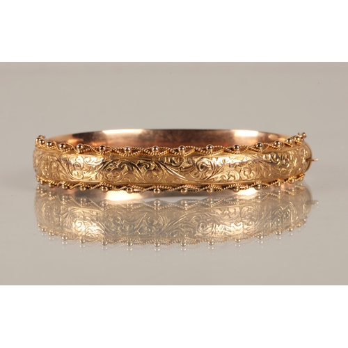 125 - 9ct gold stiff bangle bangle10.7 grams