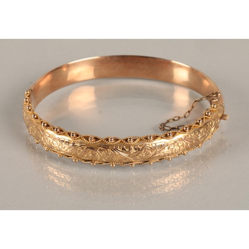 125 - 9ct gold stiff bangle bangle10.7 grams