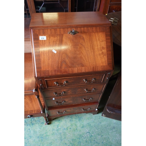 570 - Mahogany bureau with fitted interior.