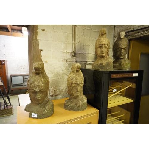 572 - Four stone garden busts.