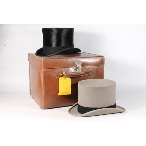 1 - Pair of early 20thC Lock and Co. of London top hats in original leather travel case.