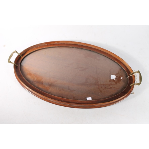 100 - Edwardian mahogany butlers tray with glazed surface, W66cm.