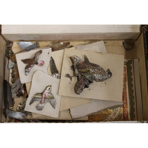 102 - Four cigar boxes containing inlays to include Oriental mother of pearl carved birds, plaster and lac... 