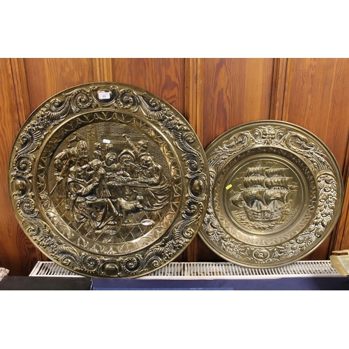 11 - Large brass charger relief decorated with tavern scene and another decorated with a Galleon, max W72... 