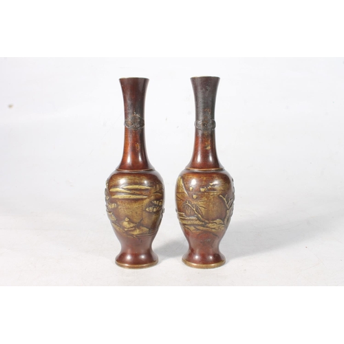 113 - Pair of Oriental bronze baluster vases.