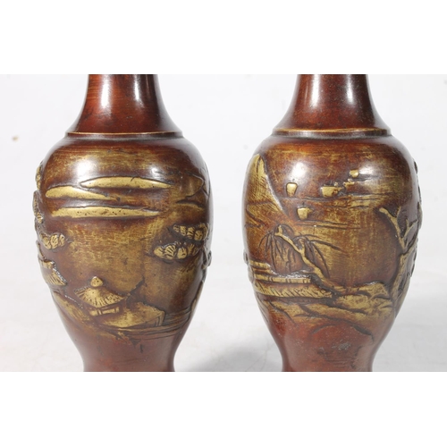 113 - Pair of Oriental bronze baluster vases.