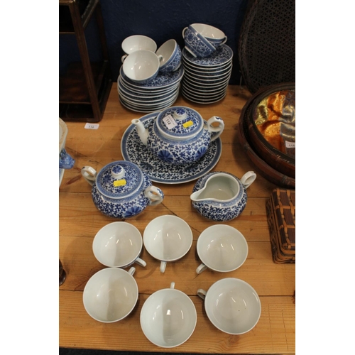 114 - 20th century Oriental blue and white porcelain tea set.