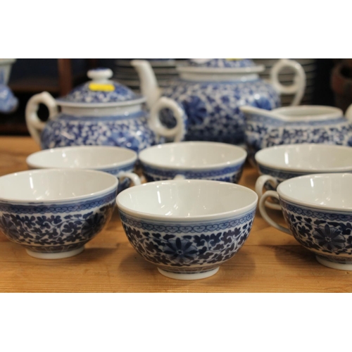 114 - 20th century Oriental blue and white porcelain tea set.