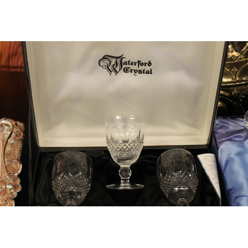 12 - Set of six Waterford crystal glasses together with a Waterford crystal decanter.