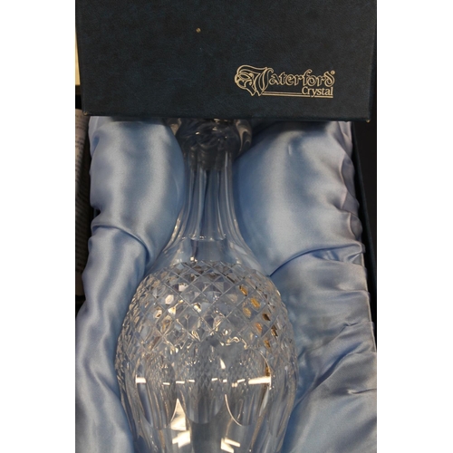 12 - Set of six Waterford crystal glasses together with a Waterford crystal decanter.