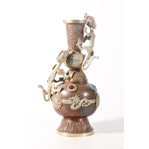 17 - Oriental style brass vase with applied pewter dragons together with one other brass vase.