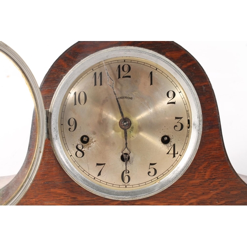 20 - Napoleon hat shaped oak mantel clock.