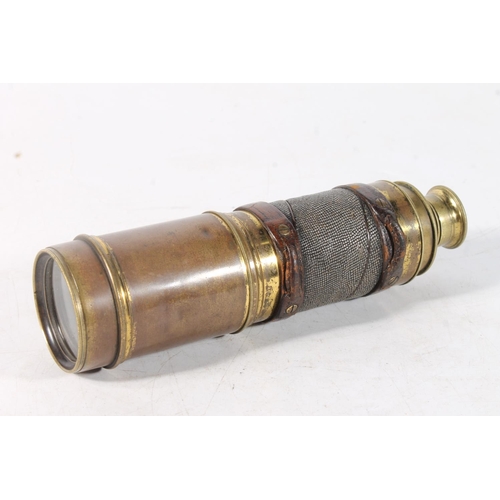 23 - Brass six-drawer telescope with shagreen collar.