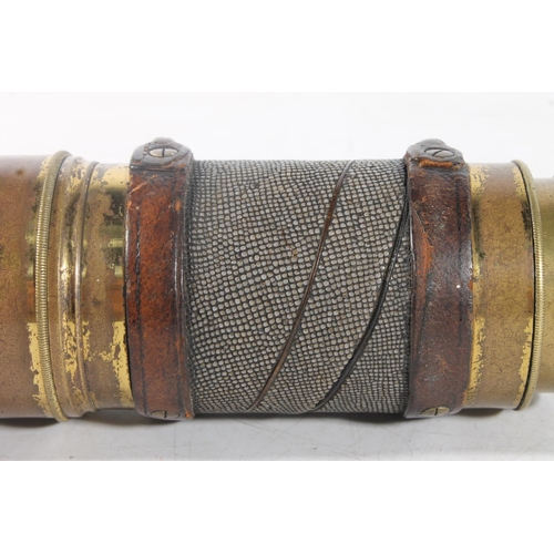 23 - Brass six-drawer telescope with shagreen collar.