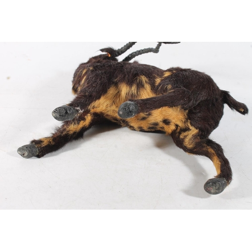 28 - Small taxidermy style model of an African antelope, H32cm.