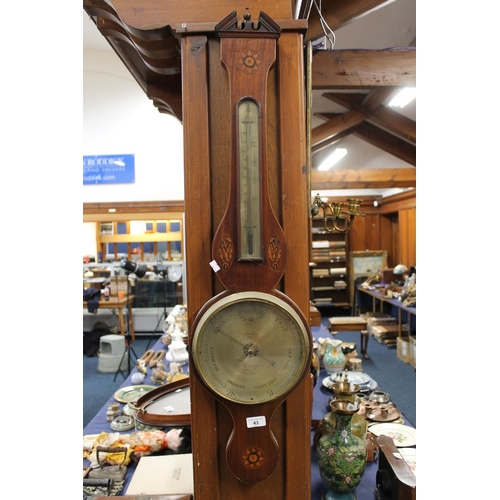 43 - Mahogany wheel barometer.