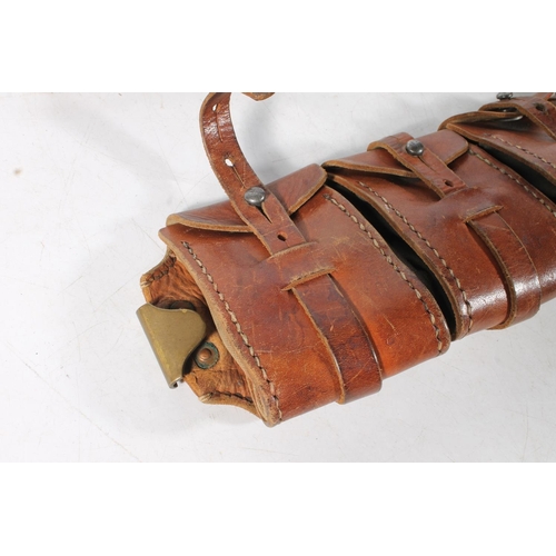 50 - Brown leather military webbing belt