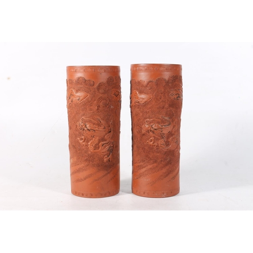 51 - Pair of Chinese terracotta Yixing type sleeve vases decorated with dragons, H24cm.