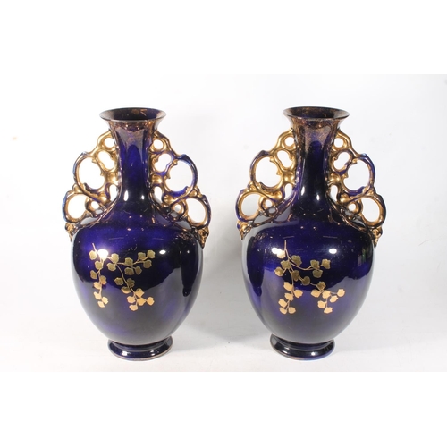 53 - Pair of large Vienna type continental pottery vases, H45cm.