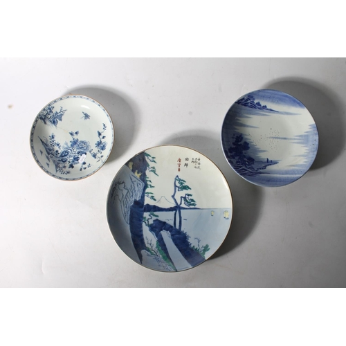 54 - Two Japanese porcelain blue and white plates together with a Chinese porcelain blue and white plate,... 