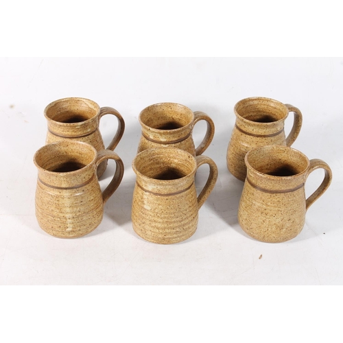 73 - Six Studio Pottery tankards.