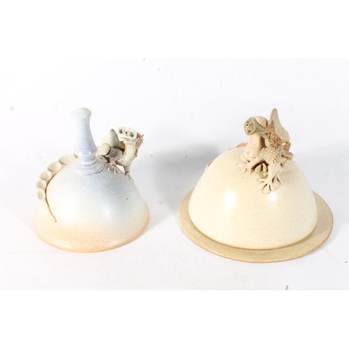 74 - Two Studio Pottery Dragon Pottery cheese domes, one with base.