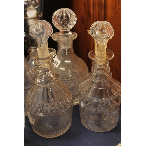 8 - Six Victorian and later cut glass decanters.