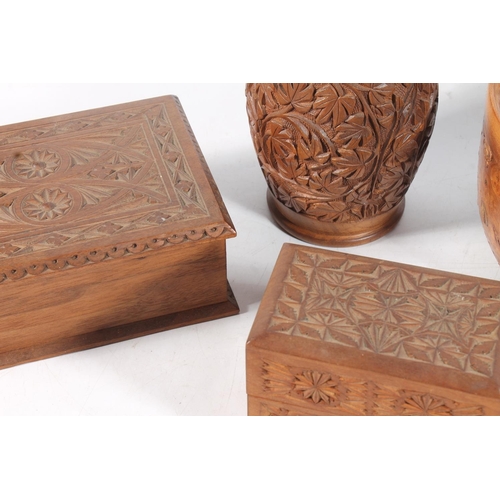 9 - Oriental chip carved boxes together with a fruitwood bowl.