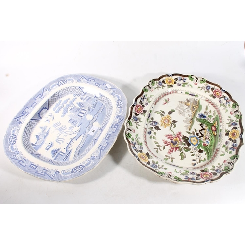 98 - Staffordshire blue and white meat plate and a Staffordhsire polychrome meat plate (2)