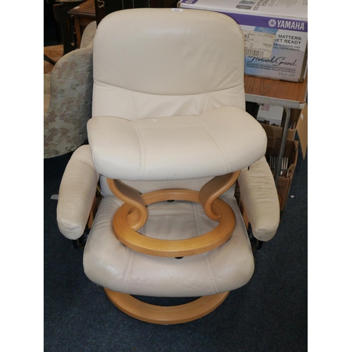 622 - Stressless cream leather armchair and footstool